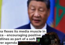 An African journalist films President Xi Jinping delivering an opening ceremony speech for the China-Africa forum in Beijing in September 2024. AP Photo/Andy Wong